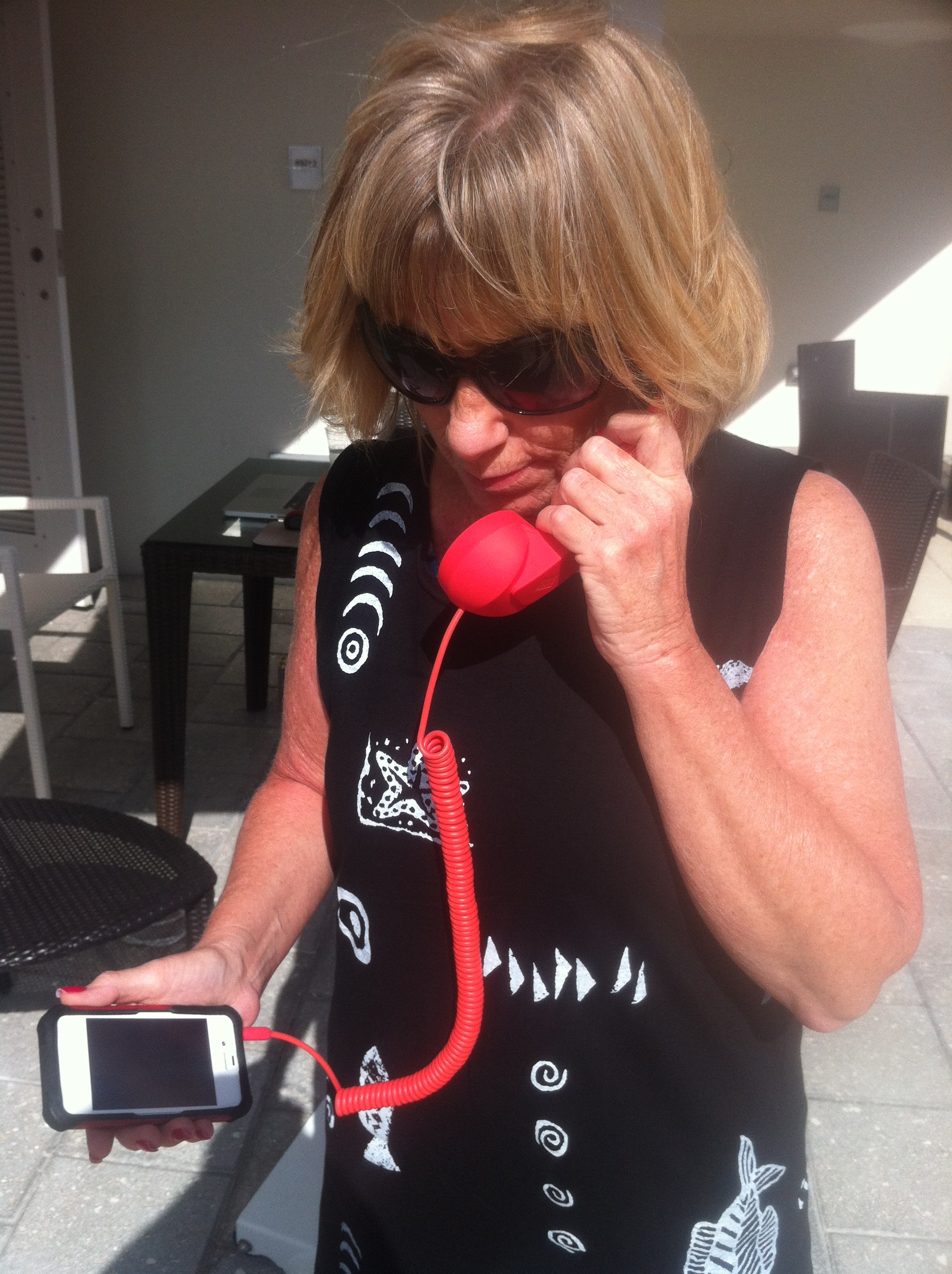 Pam from BlairCandy.com models the Pop Phone from Native Union.
