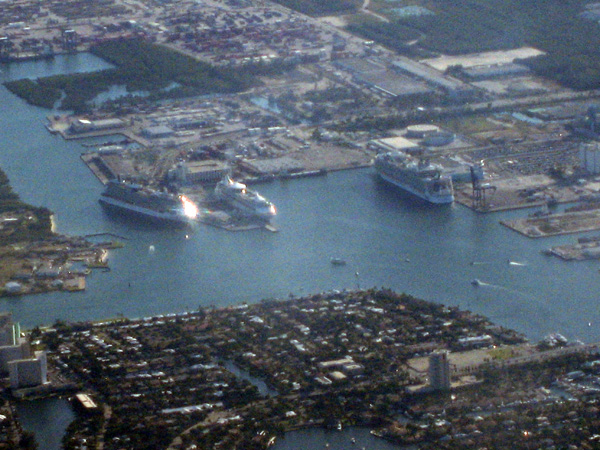 Oasis of the Seas (right) dwarfs the two ships berthed next to her.