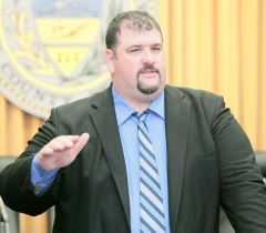 Luzerne County Comissioner Greg Skrepenak leaving a Commissioner's meeting after hearing mention of a 