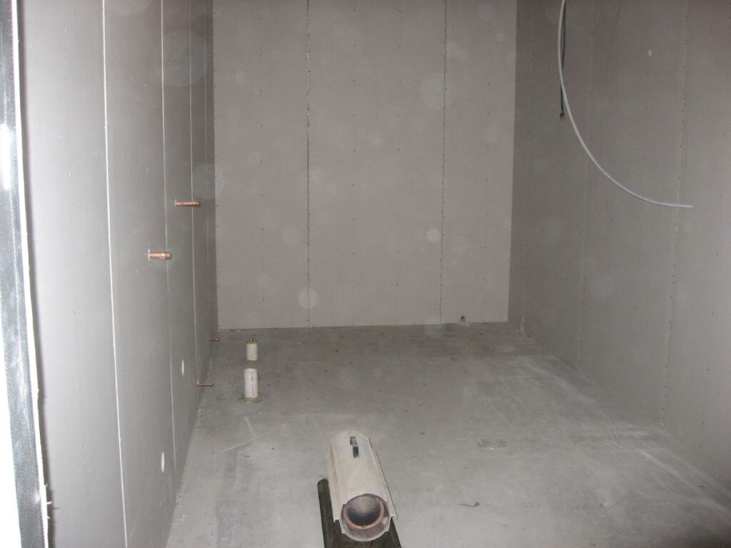 A torpedo heater running in one of the unfinished bathrooms to keep the pipes from freezing.