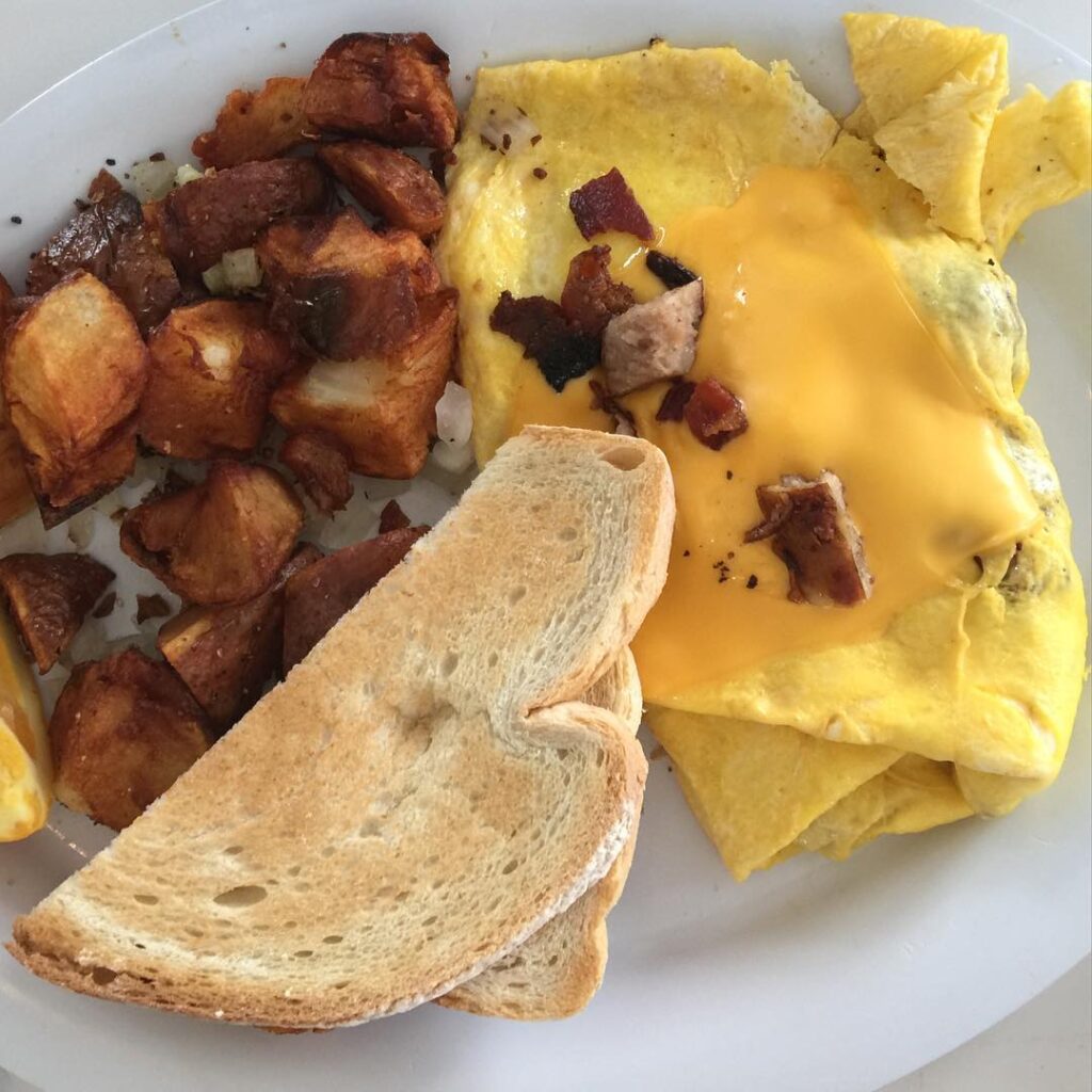 Omelette with homefries and toast from Benny's on the Beach in Lake Worth