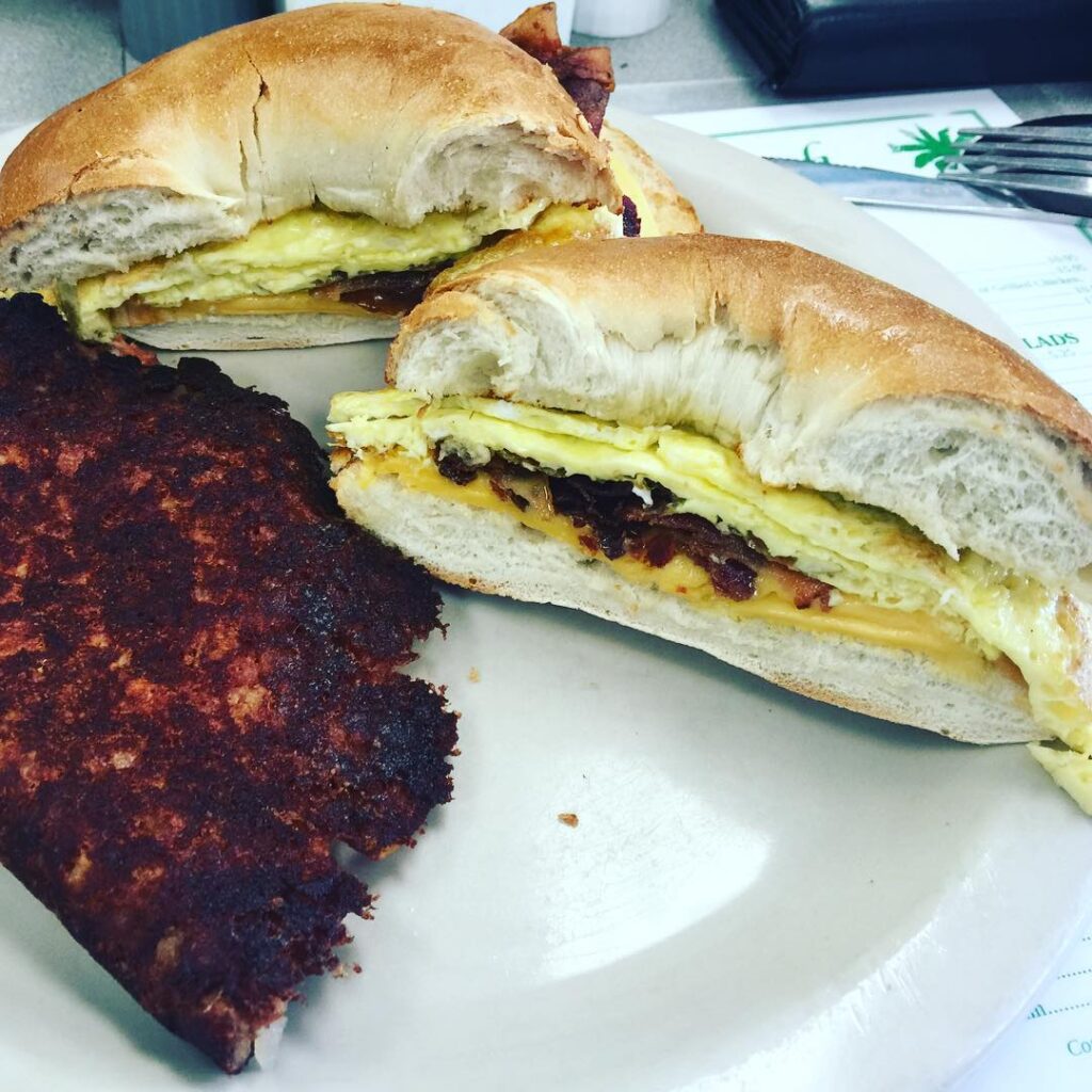 Breakfast bagel sandwich and corned beef hash from Green's Palm Beach