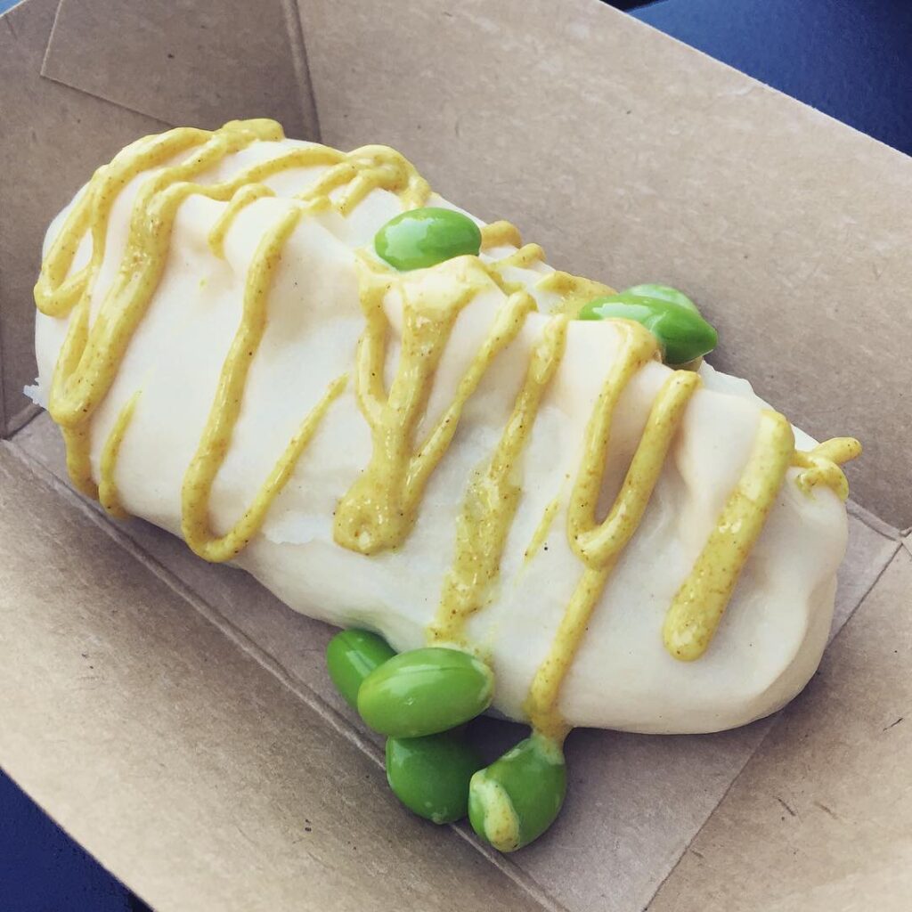 Chicken Edamame Bun - Steamed Bun filled with Chicken and Edamame and topped with Curry Sauce from the International Flower & Garden Festival at Epcot