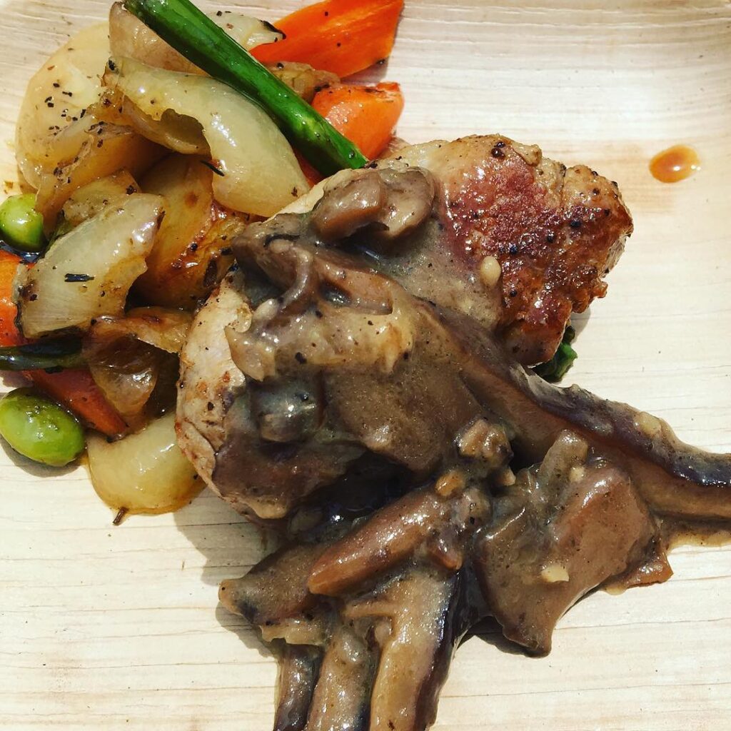 Seared Pork Tenderloin with Mushroom Ragoût, Spring Vegetables and Fingerling Potatoes from the International Flower & Garden Festival at Epcot