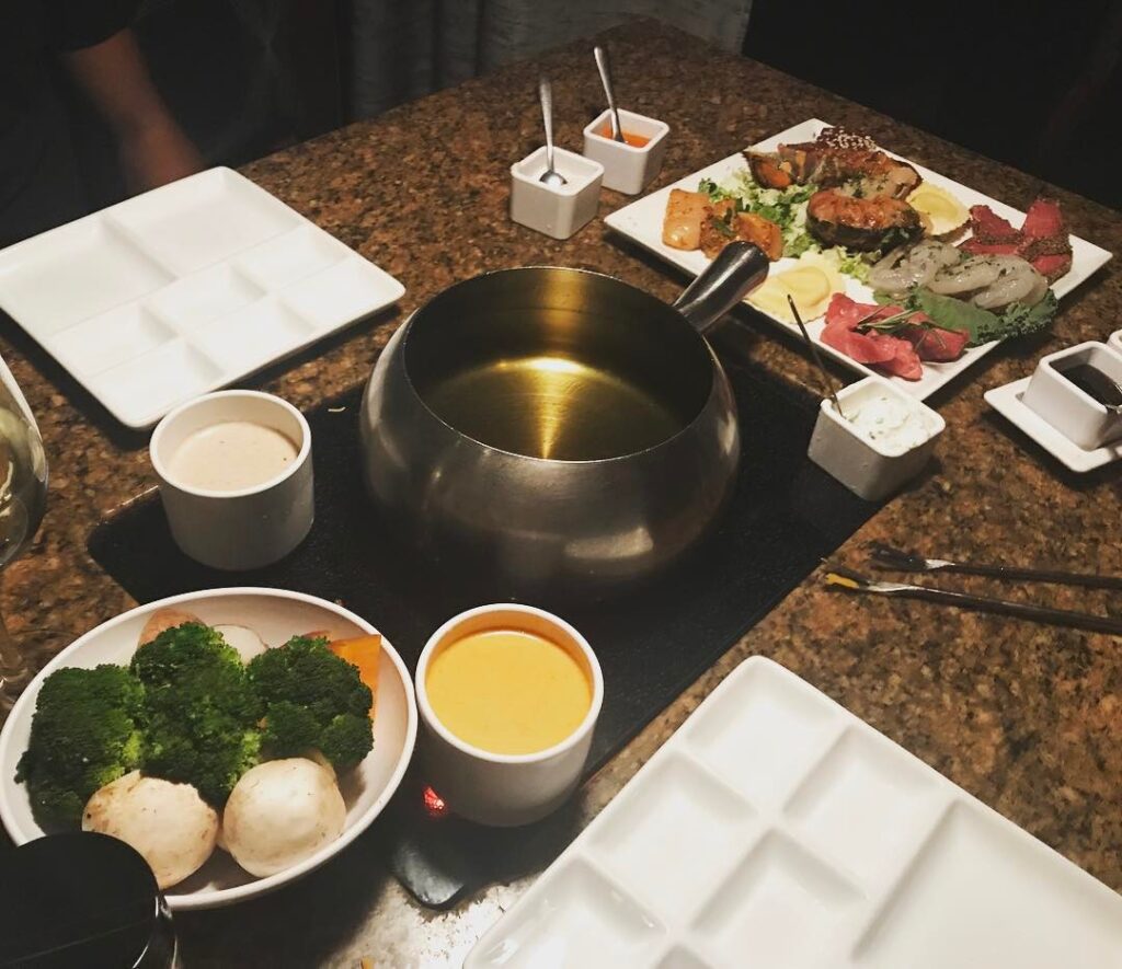 Getting ready to fondue at The Melting Pot in Boca Raton