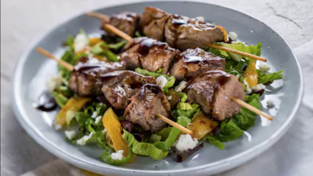 Grilled Beef Skewer with Romaine, Apricots, and Feta Cheese from the Epcot International Food & Wine Festival