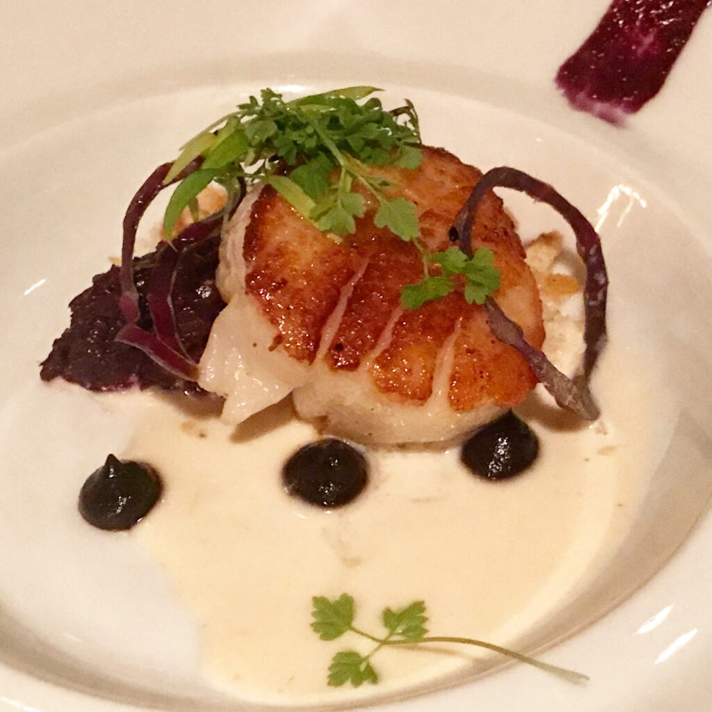Seared Gulf of Maine Scallop with Melted Red Cabbage and Shallot Jam from Victoria & Albert's inside Disney's Grand Floridian in Orlando