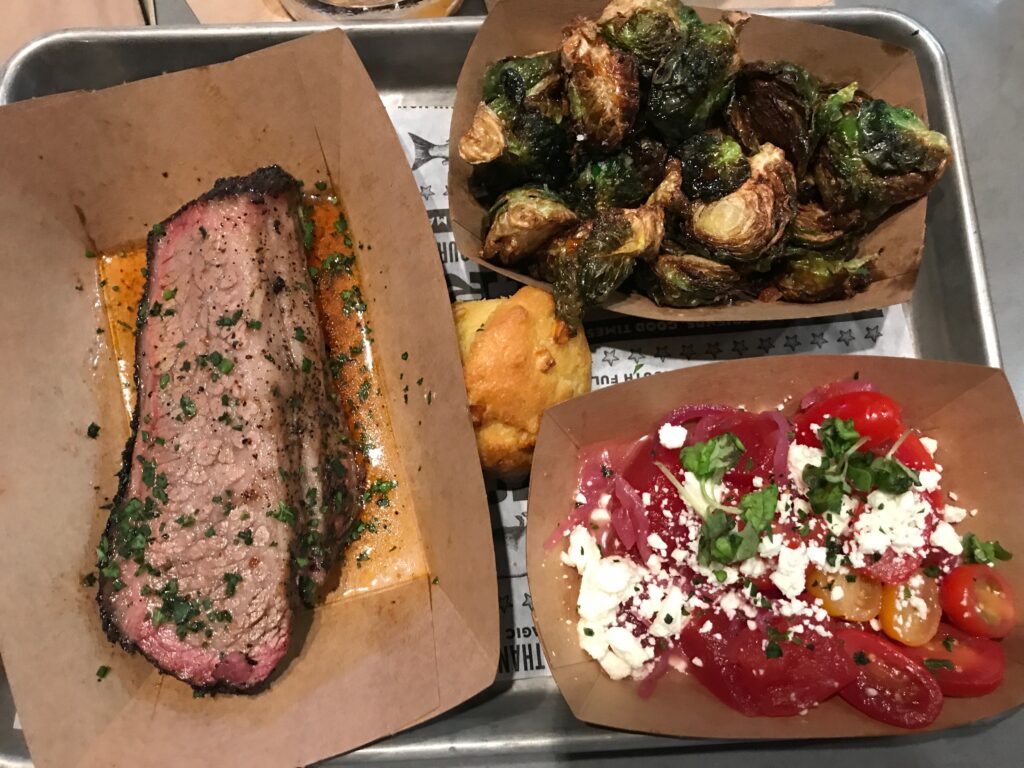Brisket with Brussels Sprouts and Tomato Watermelon Salad from The Polite Pig at Disney Springs in Orlando.  