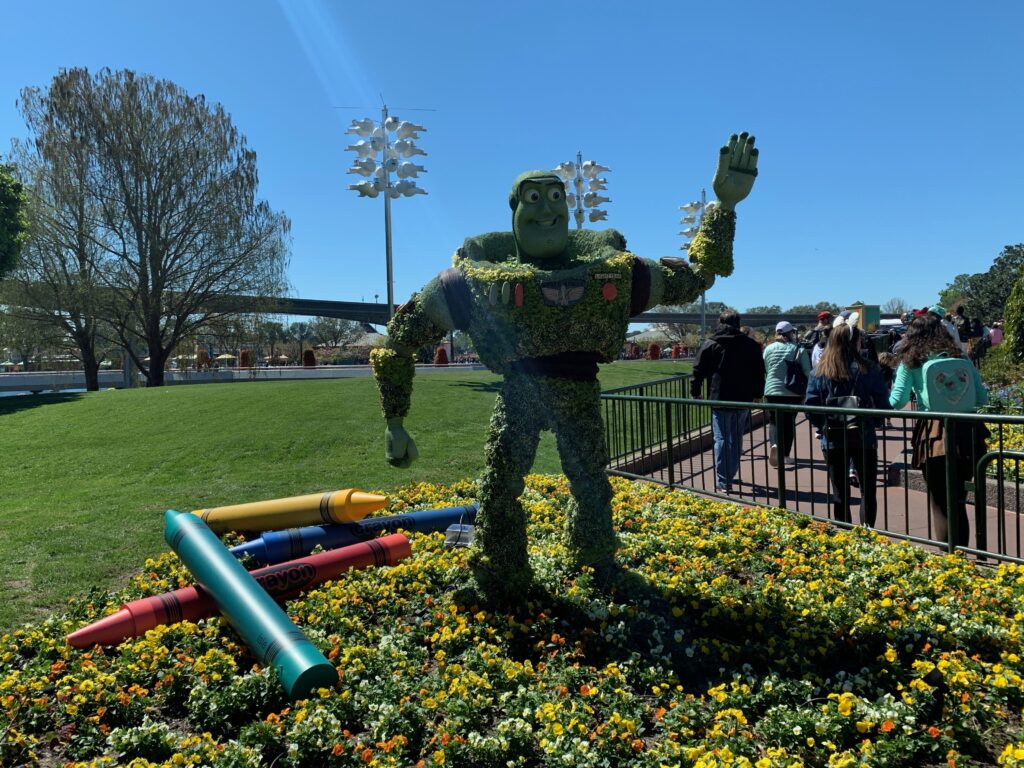 Buzz Lightyear can be found next to his friends from Toy Story along the path from Test Track that runs behind Mouse Gear